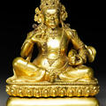 Seated figure of Kubera, the Hindu and Buddhist god of wealth Tibet, 18th –19th century Gilt bronze