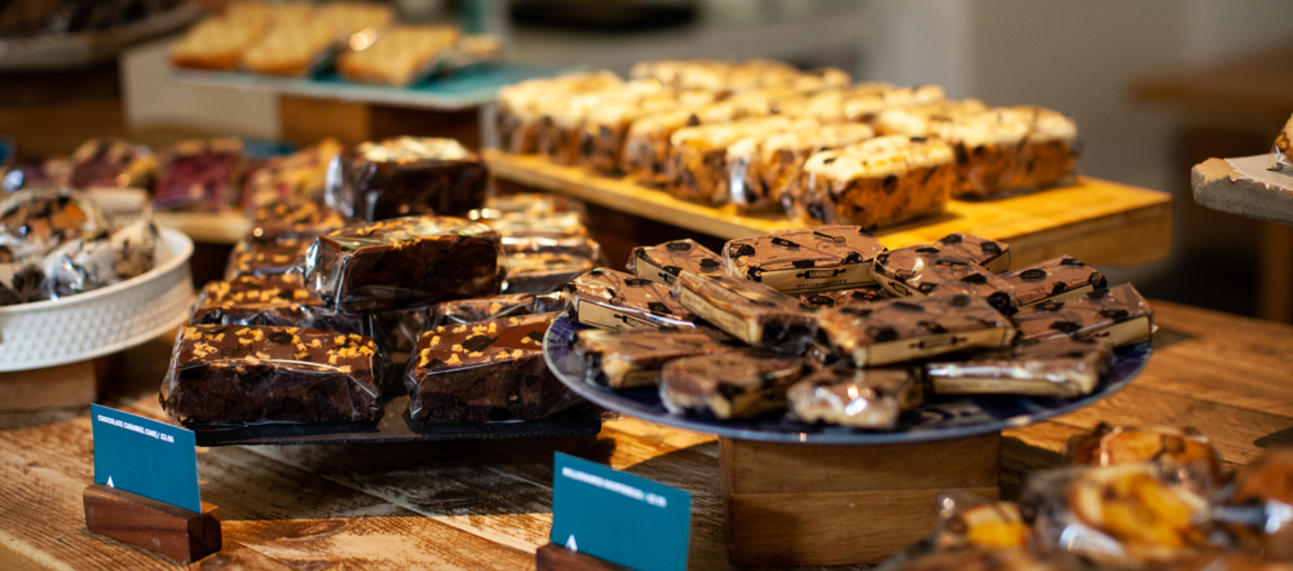 Brownies and cake slices displayed on a table