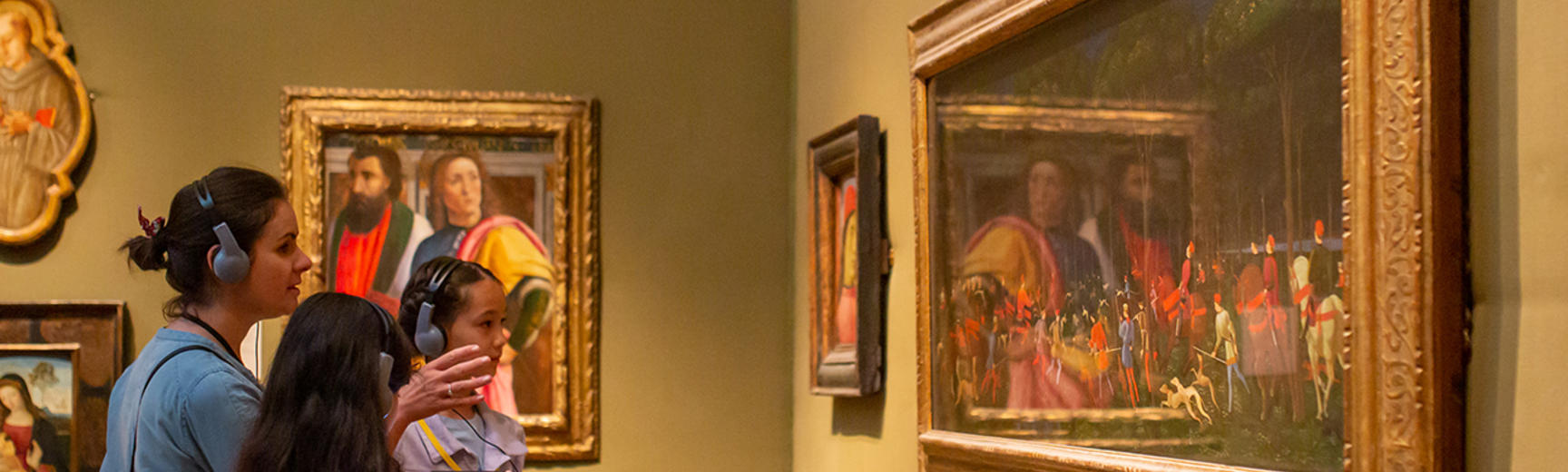 Family interacting with the Hunt in the Forest painting on the Ashmolean Adventure