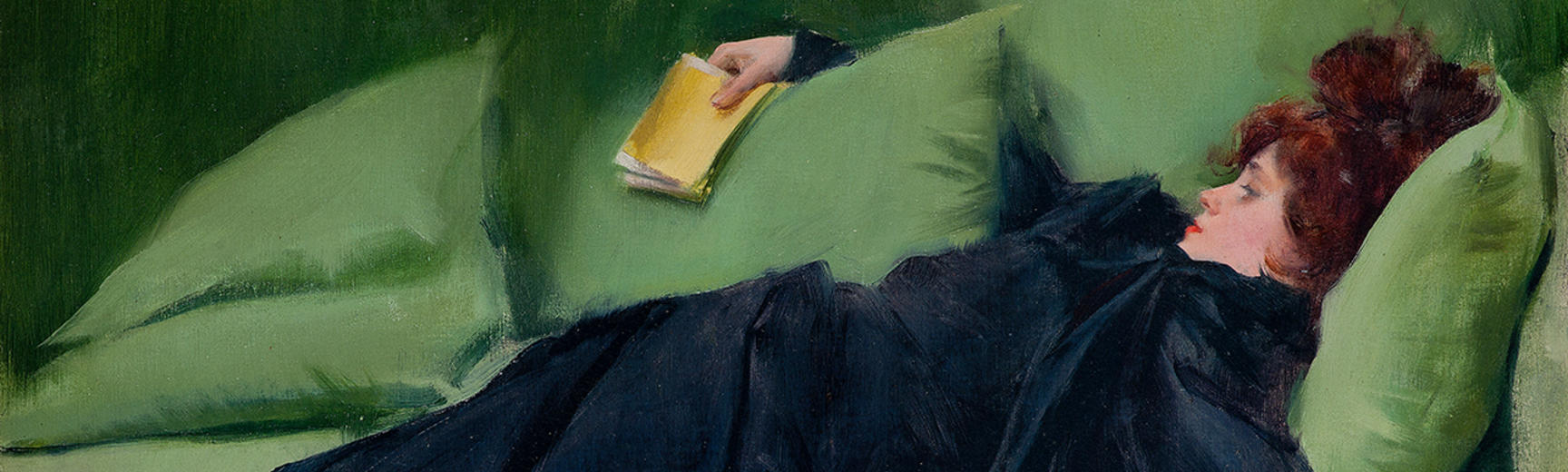 Painting by Ramon Casas of a red-haired lady in a long, black dress, laying on a vivid green sofa holding a book in one hand