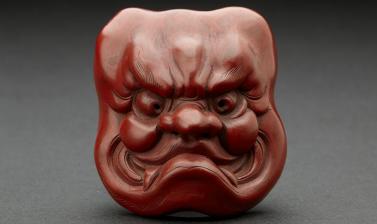  Netsuke Red lacquer mask of Ō-Beshimi by Matsuki Hōkei