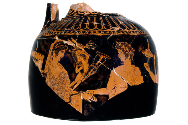 Fragmentary Athenian red-figure vase showing a wedding ceremony and the smaller figure of Eros in between. This vase is called a loutrophoros 