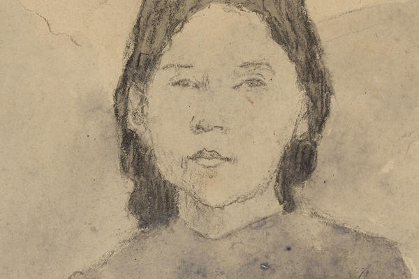 Detail from a charcoal drawing of a young girl's face