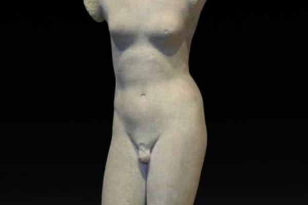 A white marble statue of Hermaphordite missing head and arms
