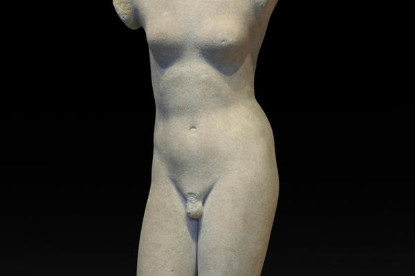 A white marble statue of Hermaphordite missing head and arms