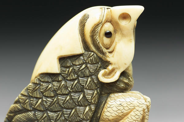 An 18th century netsuke in the shape of Tengu, the Japanese Mountain Demon who emerges from an egg