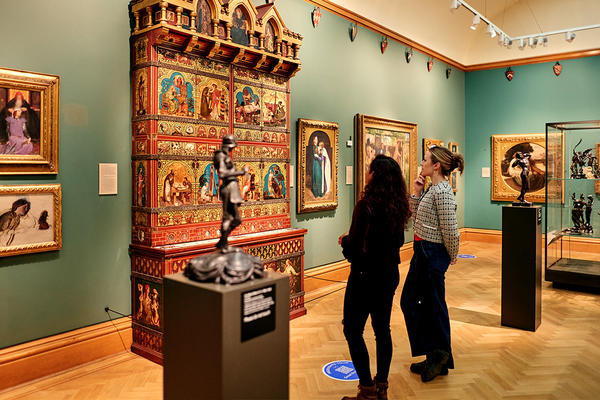 Visitors in the Pre-Raphaelites gallery in 2025