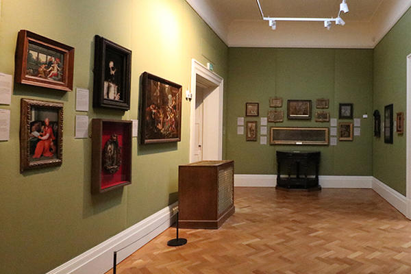 Gallery with paintings on the walls