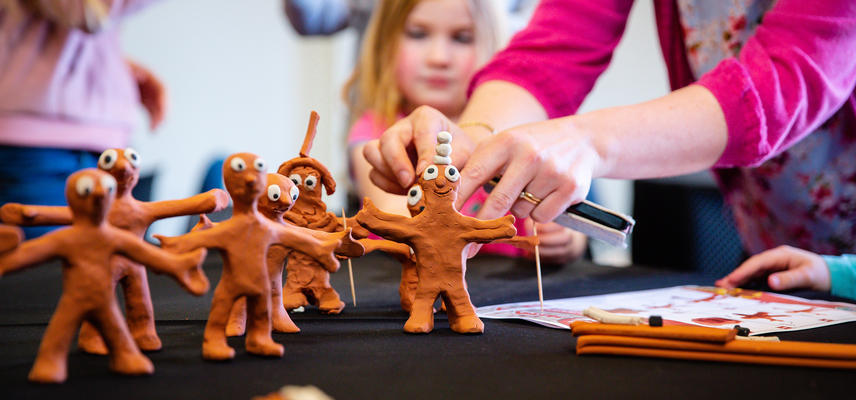 Aardman workshop session showing children making Morph models