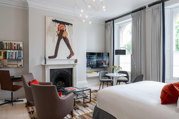 2025 This Is What You Get competition - 36 St Giles apartment artwork view A photograph of a view inside a luxury apartment showing artwork on the wall above a fireplace