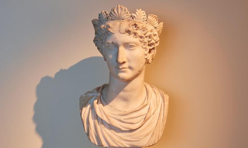 Empress Agrippina bust in the new Rome gallery, she is wearing a crown and looking down to her right