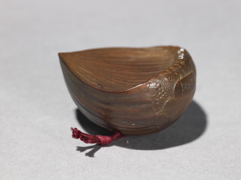 Detail of a Japanese Wooden Netsuke in the form of a Chestnut Detail of a Japanese Wooden Netsuke in the form of a Chestnut