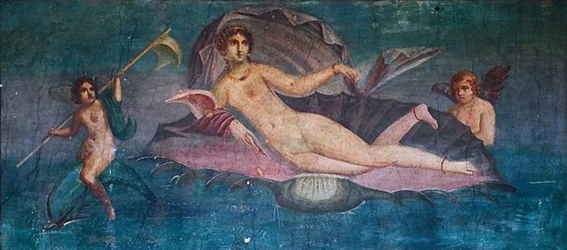 Ancient Roman wall fresco of a nude Venus lying inside a large shell, with two cherubs alongside, against a blue background.