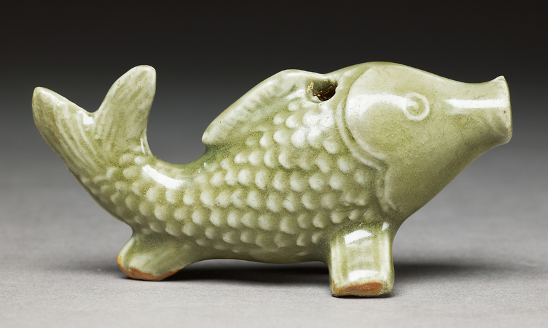 Greenware water-dropper in the form of a fish