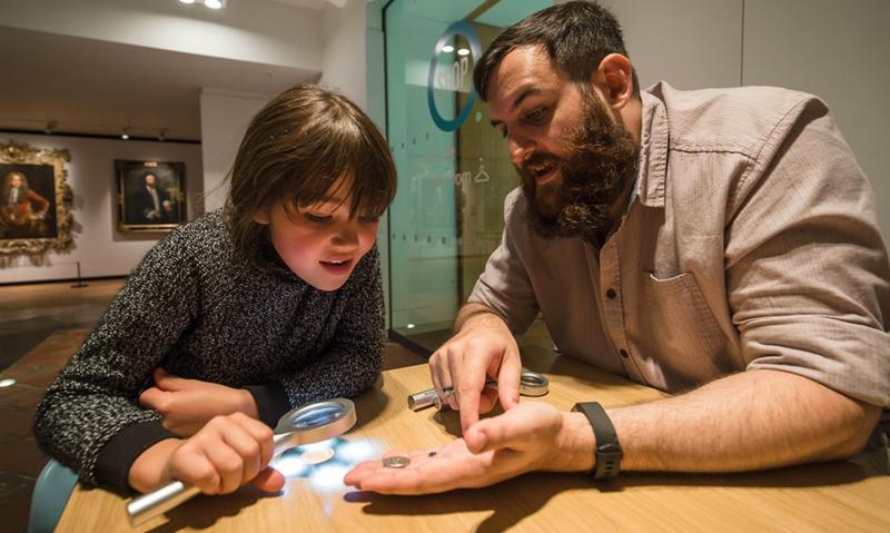 Handling coins at a family event Handling coins at a family event