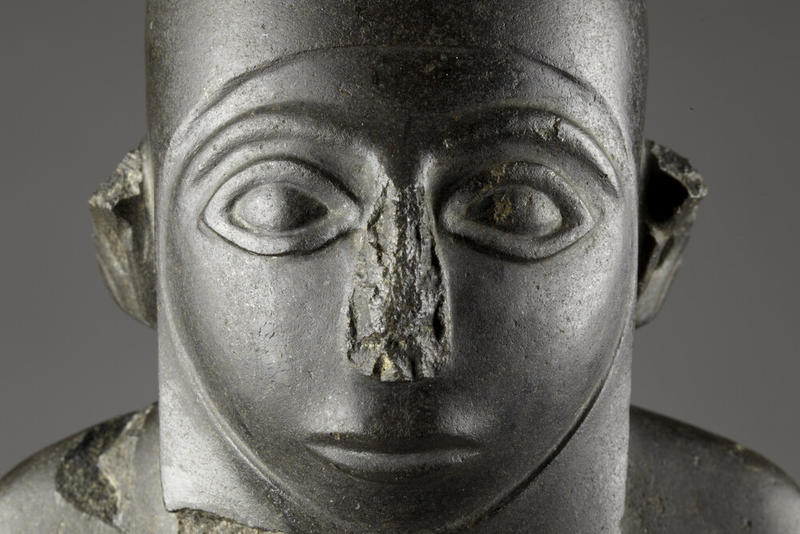 Basalt statue ('MacGregor Man'), c. 5300-3300 BC, Naqada, 39.5 cm tall. AN1922.70