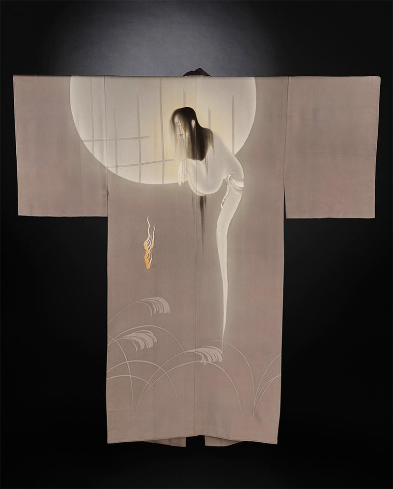Kimono showing a ghost in front of a giant moon in pale creams and muted greys