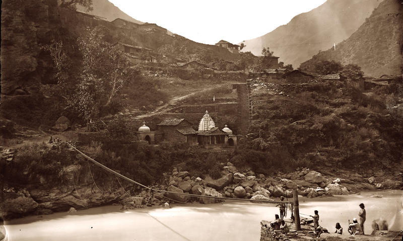 Small temple and rope bridge photograph