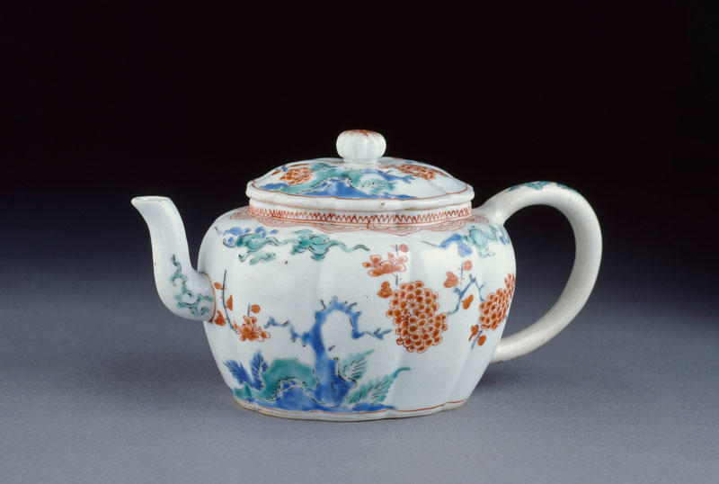 Tea pot decorated with prunus, rocks and cloud scrolls