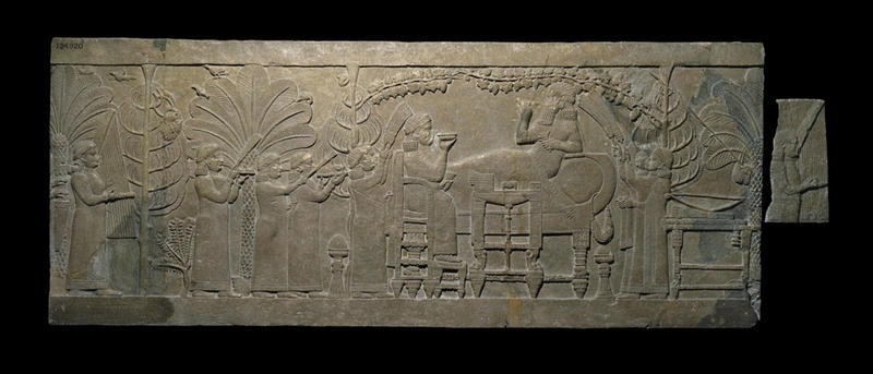 Gypsum relief; King Ashurbanipal reclines, feasting, while the head of his enemy, Teumman, King of Elam, hangs in the trees