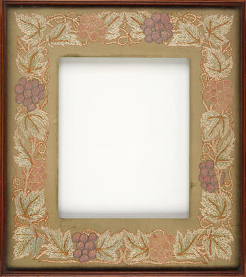 Embroidered picture frame design with leaves and fruit in subtle tones by May Morris