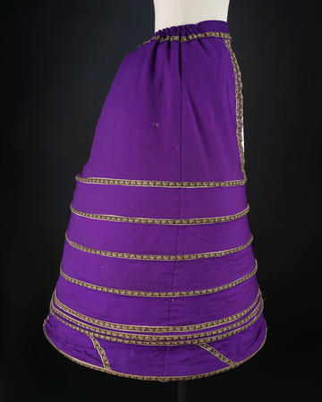 Purple crinoline with ornate braiding from Victorian times 
