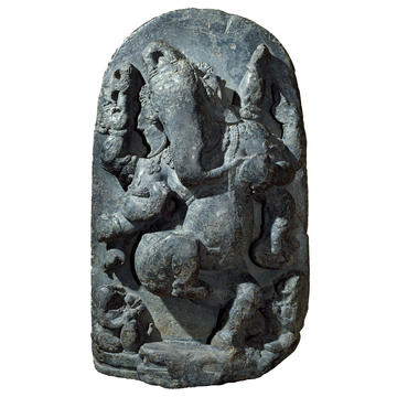 Carved figurine of Ganesha, in the form of an elephant, dancing