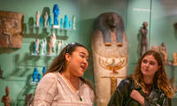 Guide showing visitors round on Uncomfortable Oxford tour of Museum