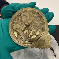 Krasis Scholar holding an astrolabe at the History of Science Museum Krasis Scholar holding an astrolabe at the History of Science Museum